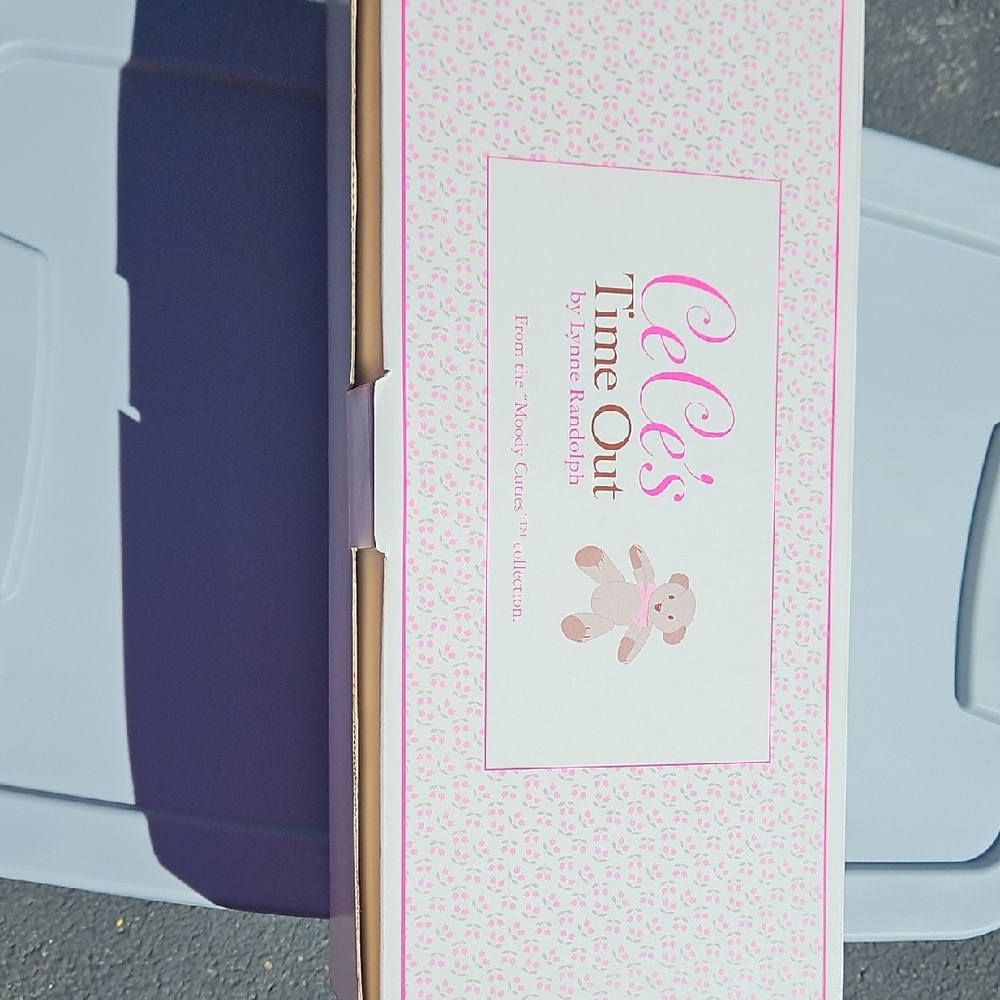 Crown Porcelain Doll with Pink Accents